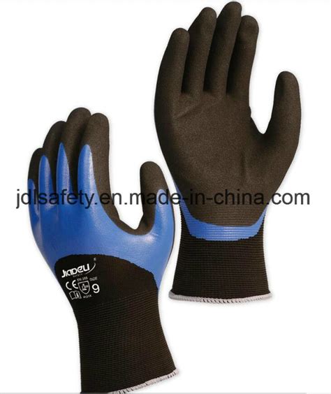 13 Gauge Black Nylon Safety Glove With Blue Smooth Nitrile Half Coating