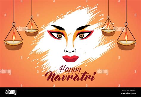 feliz celebración navratri con la diosa cara amba y velas colgando