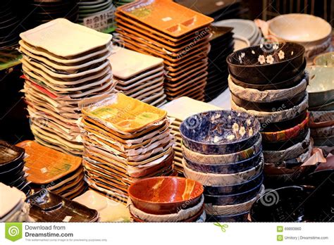 Japanese Handmade Ceramic Dishes Are Displayed For Sale In Doguyasuji