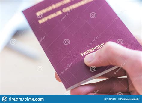 Passport Vacation Concept Close Up Of Fingers Holding A Passport