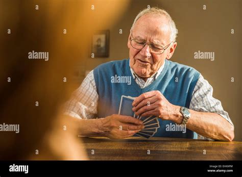 Senior Man Playing Cards Stock Photo Alamy