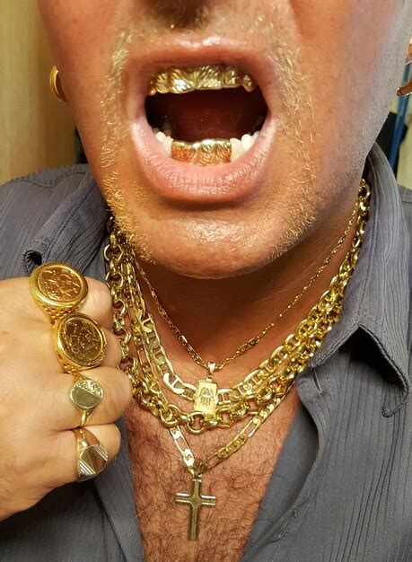 Premium Photo Midsection Of Man Wearing Gold Chains