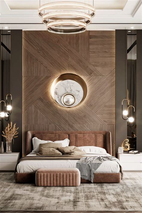 A Bedroom With A Large Bed And Round Mirror On The Wall Above It S