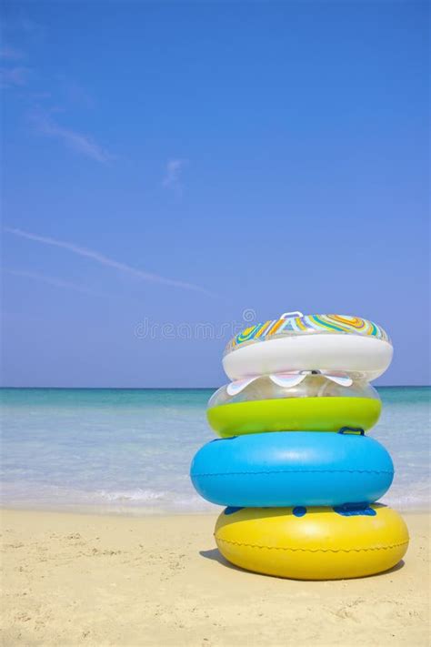 Stack Of Swimming Tubes On The Beach Stock Image Image Of Leisure