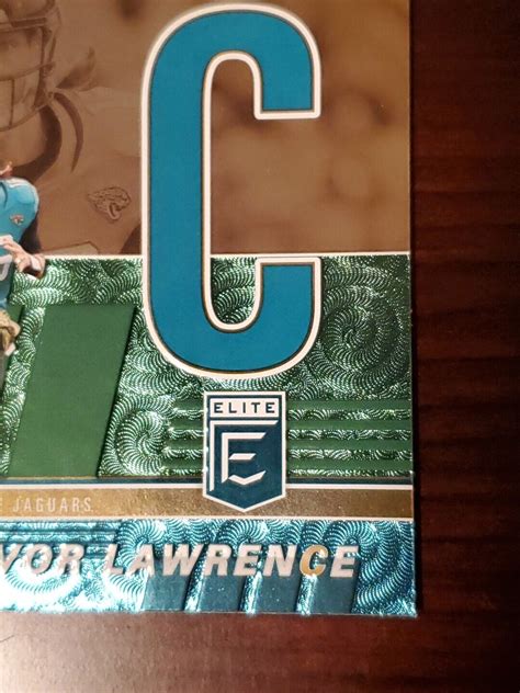 2022 Panini Donruss Elite Spellbound Green Letter C SB TL7 Trevor