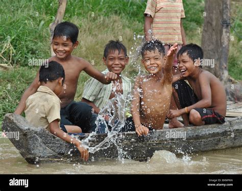 Cambodian Children Playing In Kompong Khleang Tonle Sap Lake Cambodia