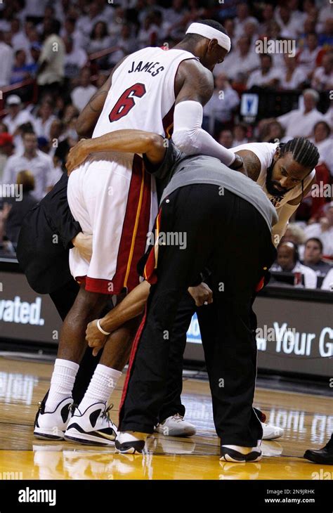 Miami Heat Small Forward Lebron James 6 Is Carried From The Floor After Taking A Spill Against