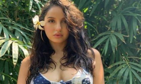 Nora Fatehi shares sizzling photos vacationing by the beach