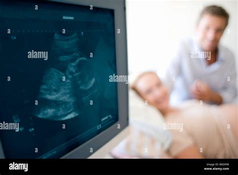 Pregnant Woman Doing Ultrasound At Clinic Stock Photo Alamy