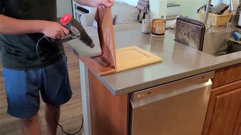 How To Remove Thermofoil Vinyl Wrap Melamine From Cabinet Doors Youtube