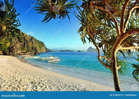 Beautiful Beach With Rocks On The Background Of The Islands Stock Photo