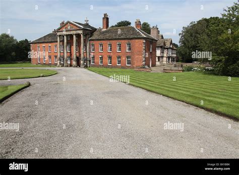 Adlington Hall & Gardens, England. Late summer view of the lawn and ...