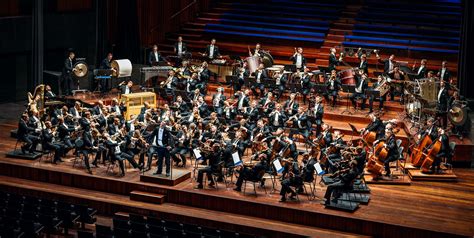 Photographer Creates Picture Of 100 Man Orchestra With The Same Person