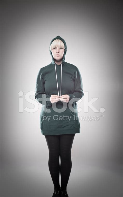 Blonde Girl Posing In Green Hooded Sweater Stock Photo Royalty Free Images FreeImages