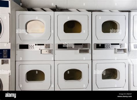 Coin Operated Laundry Machines Stock Photo - Alamy