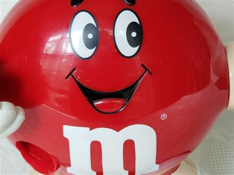 Red M&M Candy Dispenser with Waving Hand – SOLD – Aunt Gladys' Attic