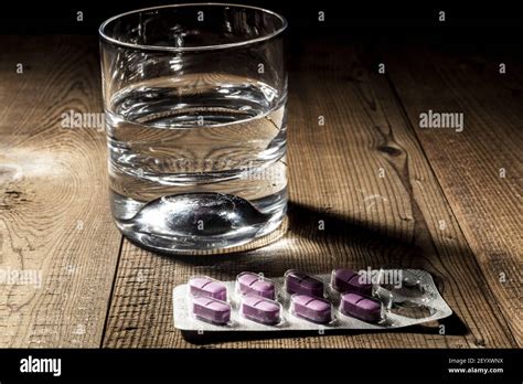 Water and Pills Stock Photo - Alamy