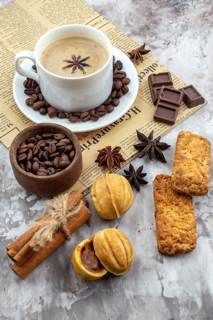 Premium Photo Bottom View Cup Of Coffee With Anise Biscuits Roasted