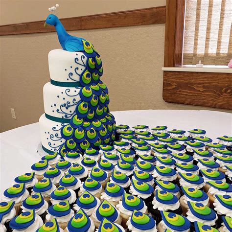 This Amazing Custom Wedding Cake Of A Peacock Has A Train Made Up Of Cupcakes