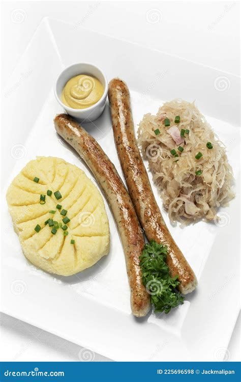 German Thuringer Sausage With Mashed Potato And Sauerkraut Meal Stock