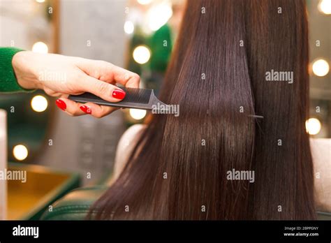 Straight And Shiny Hair After Lamination Hairdresser Demonstrates The