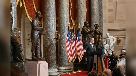 Lawmakers Unveil Statue Of Billy Graham In Us Capitol