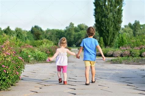 Children walking hand in hand — Stock Photo © odenis83 #44535495