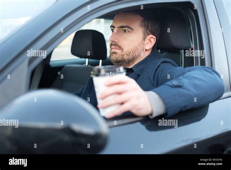 Man Drinking Coffee Driving Car Hi Res Stock Photography And Images Alamy