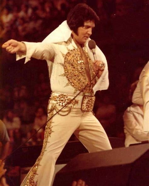 Iconic Elvis Presley Performing On Stage In The 70s