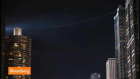 Watch Tightrope Walker Crosses Skyscrapers Breaks Record Bloomberg