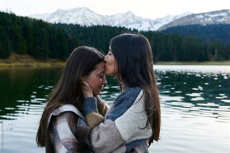 Young Lesbian Couple Sharing A Kiss In Nature By Stocksy Contributor Ivan Gener Stocksy