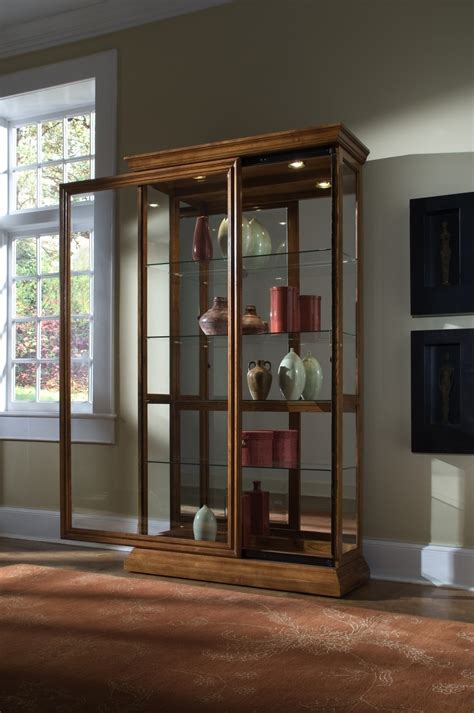 Lighted Sliding Door Shelf Curio Cabinet In Golden Oak Brown By