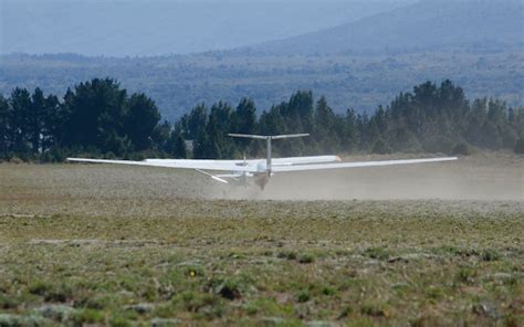 Premium Photo Light Aircraft Towing Ultralight Glider