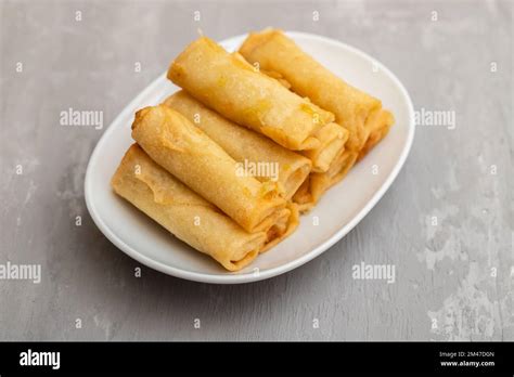 Spring Roll Also Known As Egg Roll On White Dish Stock Photo Alamy