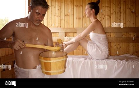 Couple Relaxing In Hot Sauna Authentic Real Sauna Moment Stock Photo