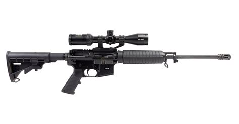 Bushmaster Xm 15 Qrc 5 56mm Semi Automatic Rifle With Bushnell Ar 223 Riflescope Magazine Not