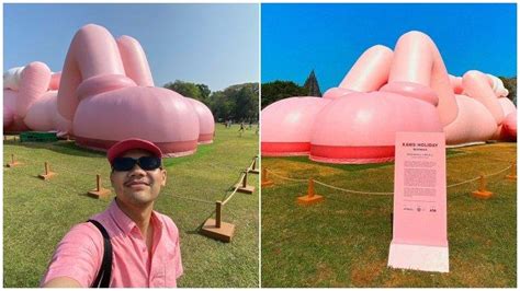 Apa Itu Kaws Holiday Patung Pink Yang Lagi Rebahan Di Candi Prambanan