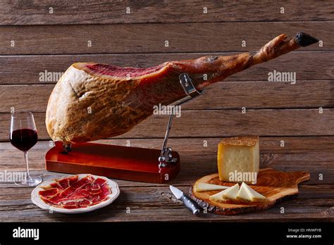 Iberian Ham Pata Negra From Spain Manchego Cheese And Red Wine Stock