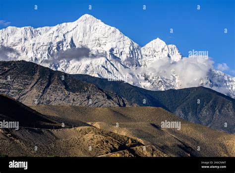 The White Snowy Nilgiri Mountain Peak Seen From Kagbeni Village In