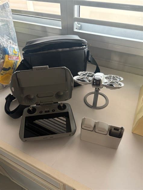 Dji Neo combo with RC 2 controller, Photography, Drones on Carousell