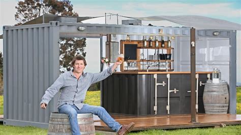 Kyle Cawood shows off the mobile bar that he built from a shipping ...