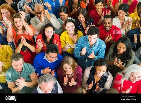 Diverse crowd clapping Stock Photo - Alamy