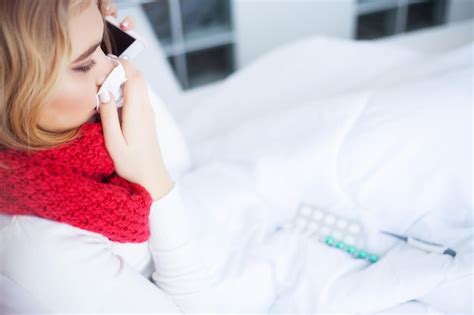 Premium Photo Sick Woman With A Cold Is Treated At Home In Bed