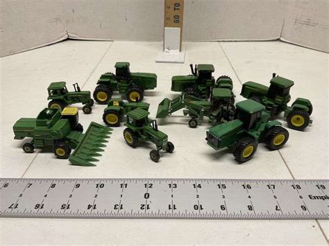 John Deere toy tractors - Legacy Auction Company