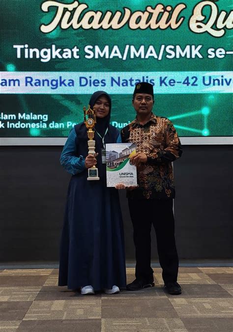 KAMILA HASNA SISWA MAN 1 GRESIK RAIH JUARA 1 MHQ 10 JUZ TINGKAT