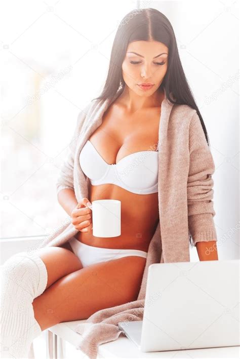 Woman In Lingerie Working On Laptop Stock Photo Gstockstudio 90969762