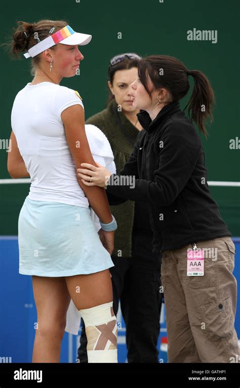 Belgium S Yanina Wickmayer Receives Treatment On Her Right Knee While