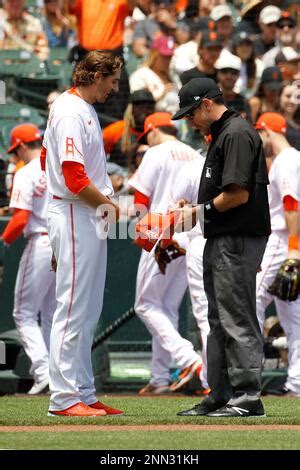 Third Base Umpire Ryan Additon Looks On In The Third Inning Of A