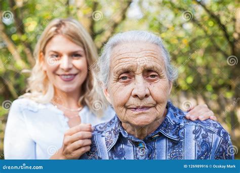 Woman Embracing Grandma Stock Photo Image Of Charming 126989916