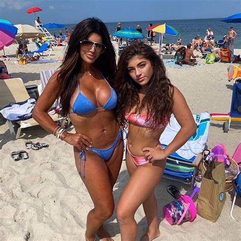 Rhonjs Teresa Giudice Flaunts Her Incredible Figure In A Blue Bikini